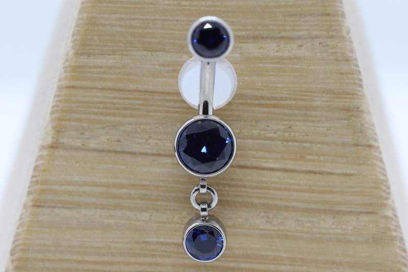 Bezel-set Round Faceted Gem Curved Barbell - Medium Blue Spinel